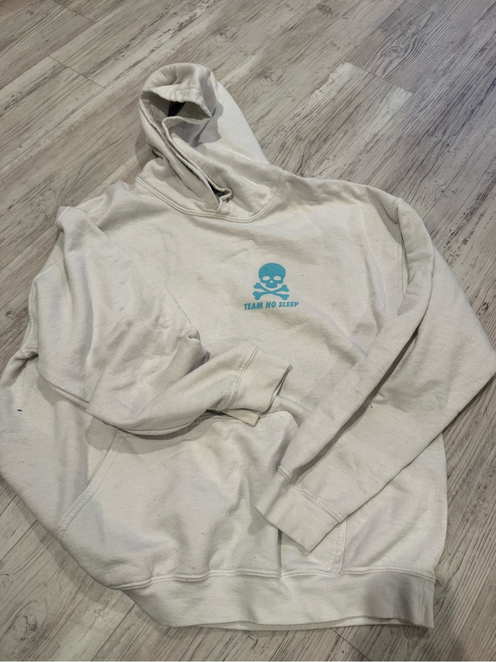 Comfort Colors Cream Hoodie with Turquoise Skull Logo